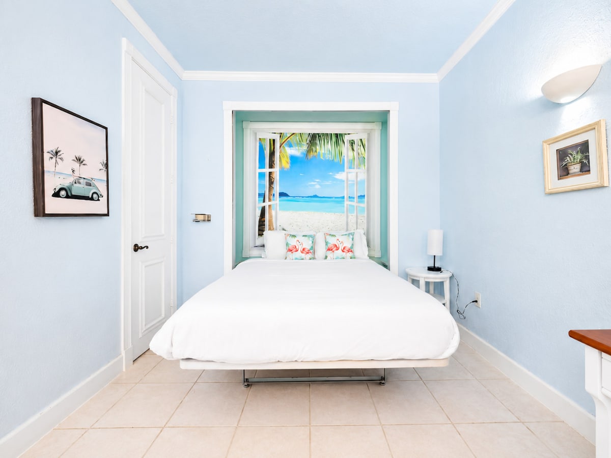Poolside Retreat queen bed area